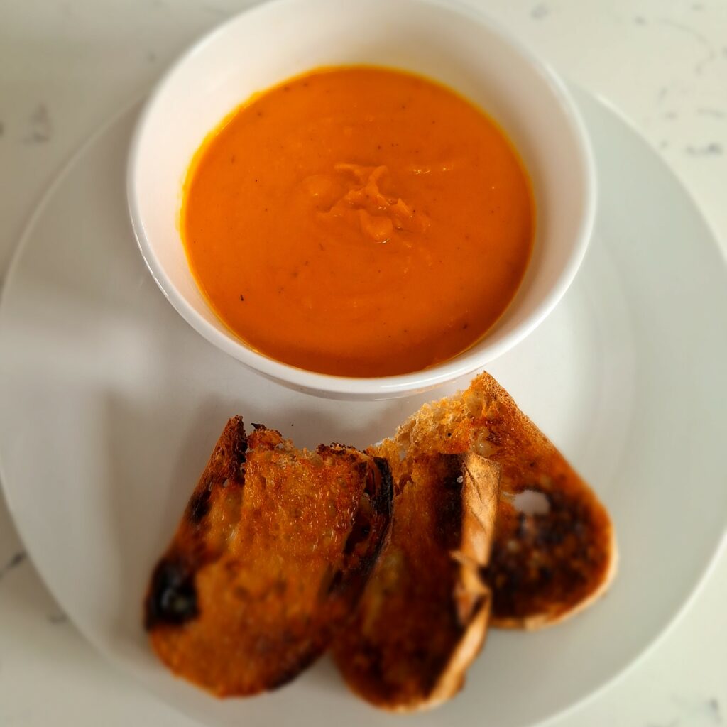 A Bowl of Roasted Butternut Squash Soup with Toasted Sourdough